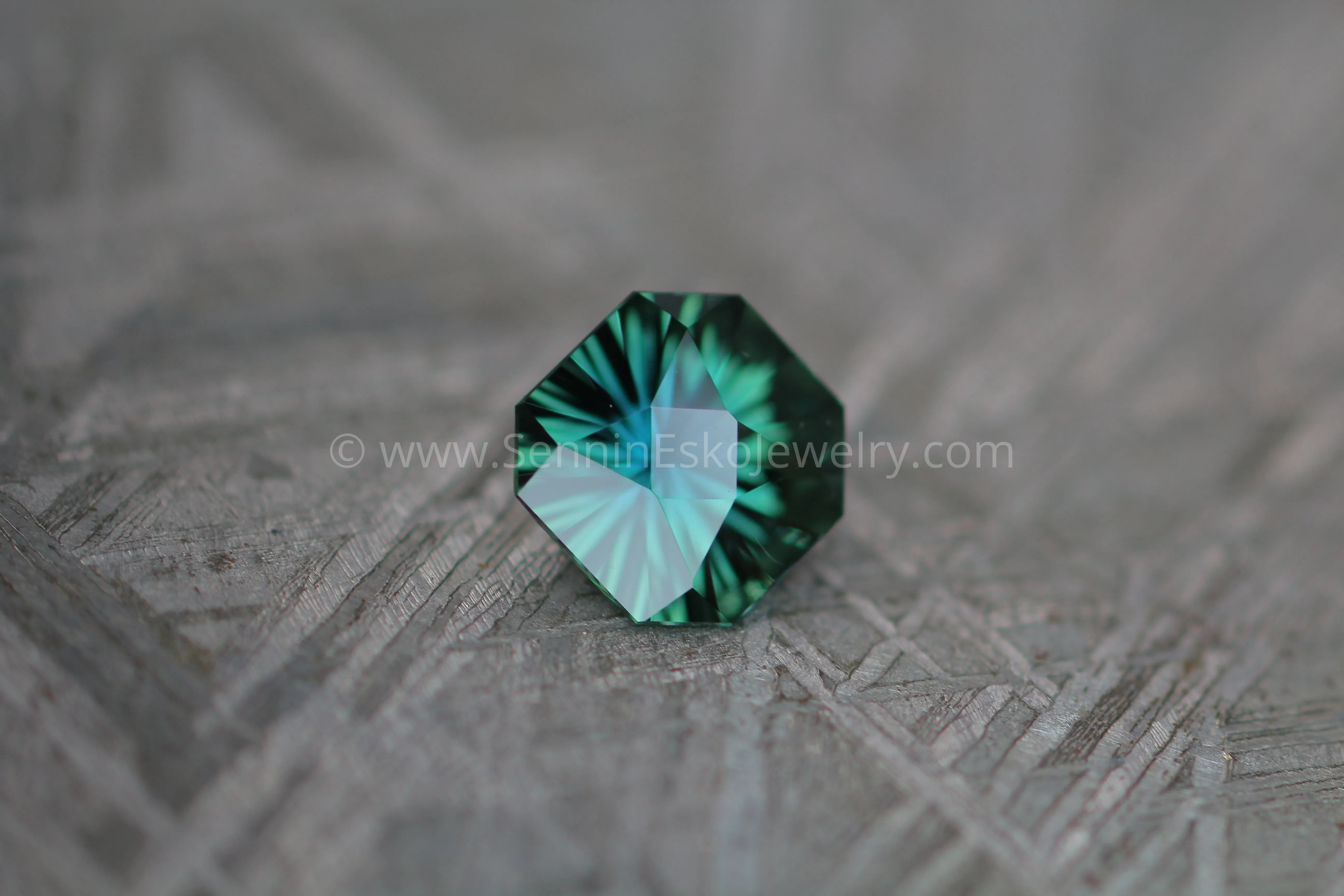 0.64 carat Teal Sapphire Octagon - Fantasy Cut, 5.3x5.7mm