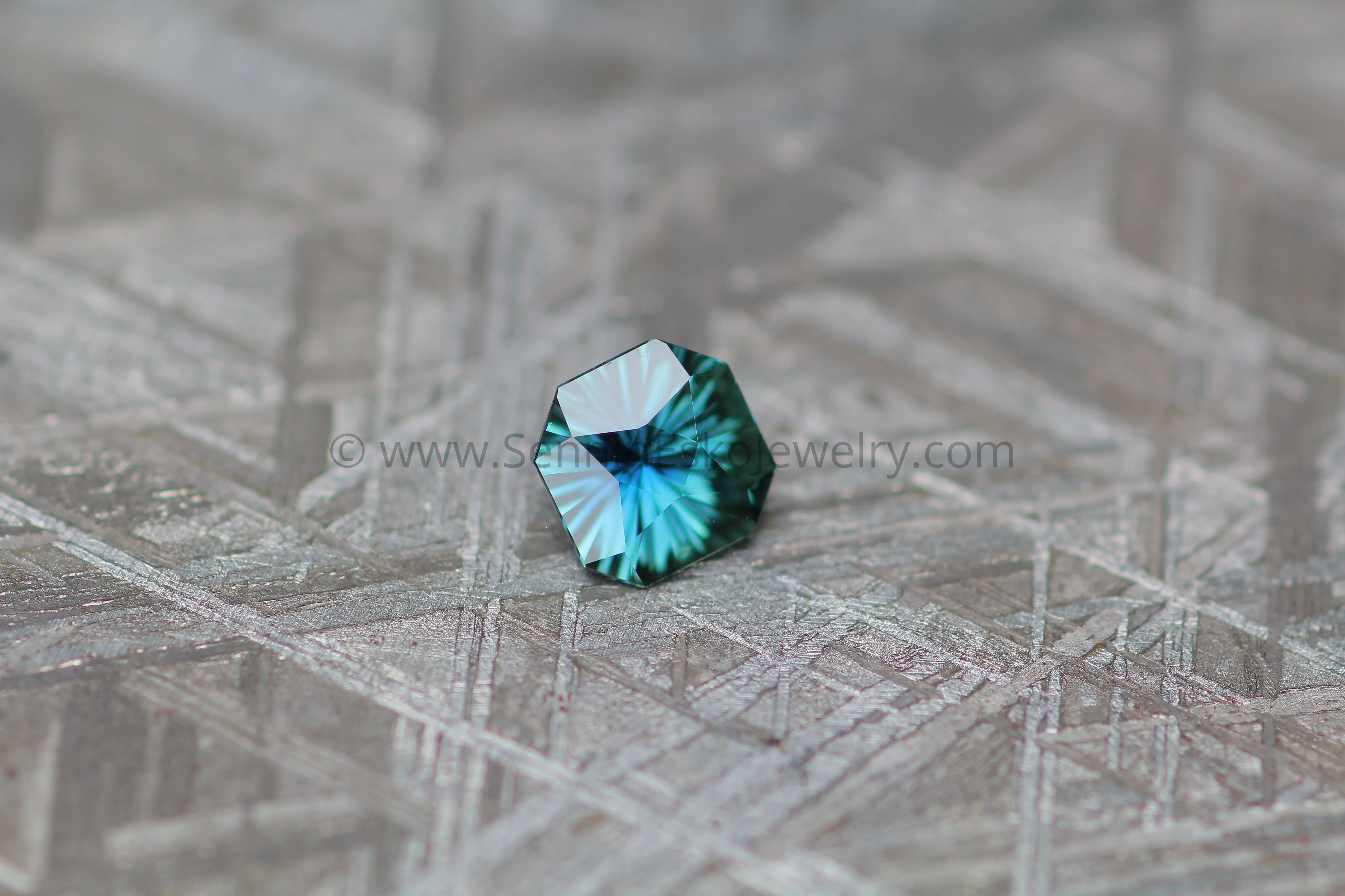 0.64 carat Teal Sapphire Octagon - Fantasy Cut, 5.3x5.7mm