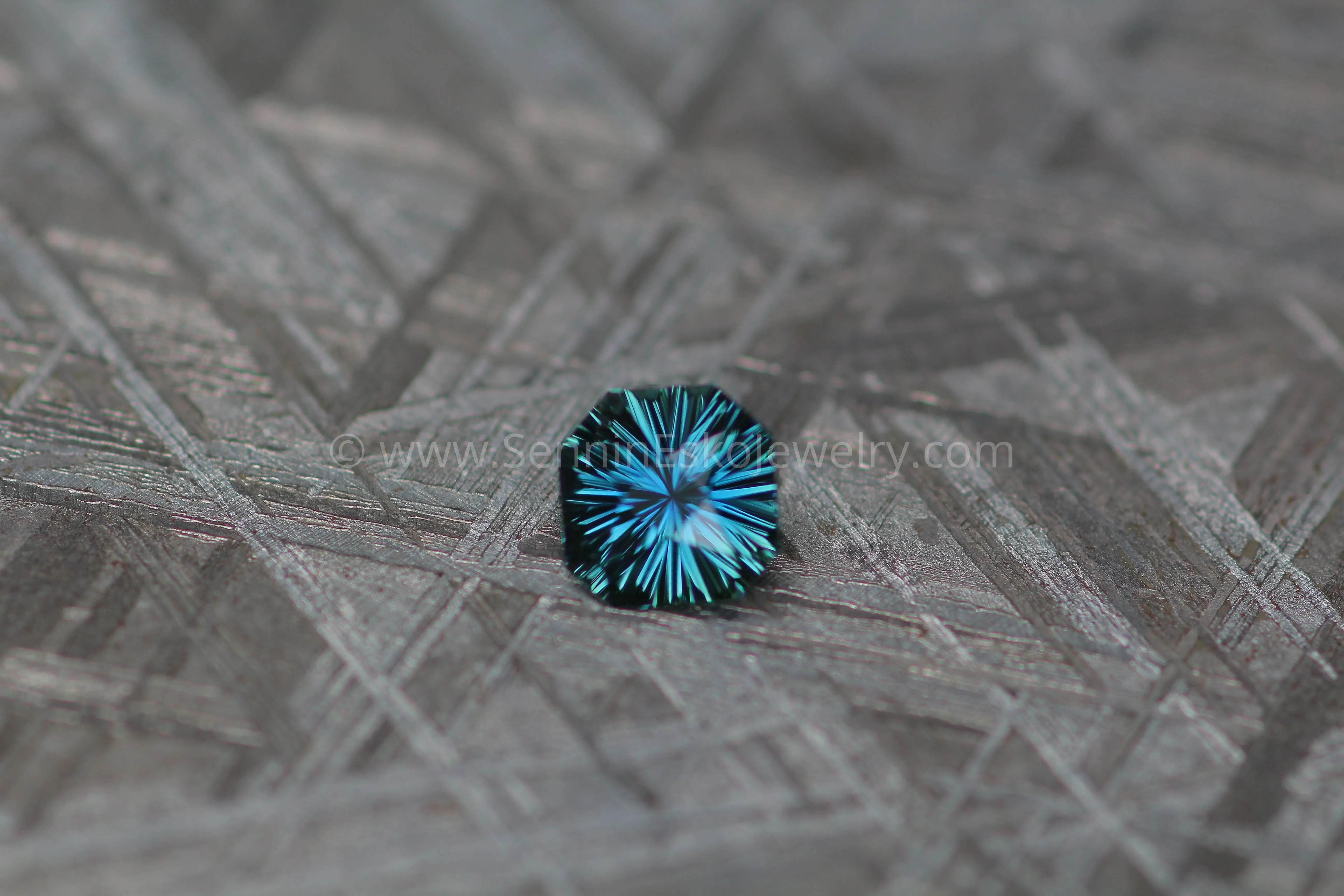 0.64 carat Teal Sapphire Octagon - Fantasy Cut, 5.3x5.7mm