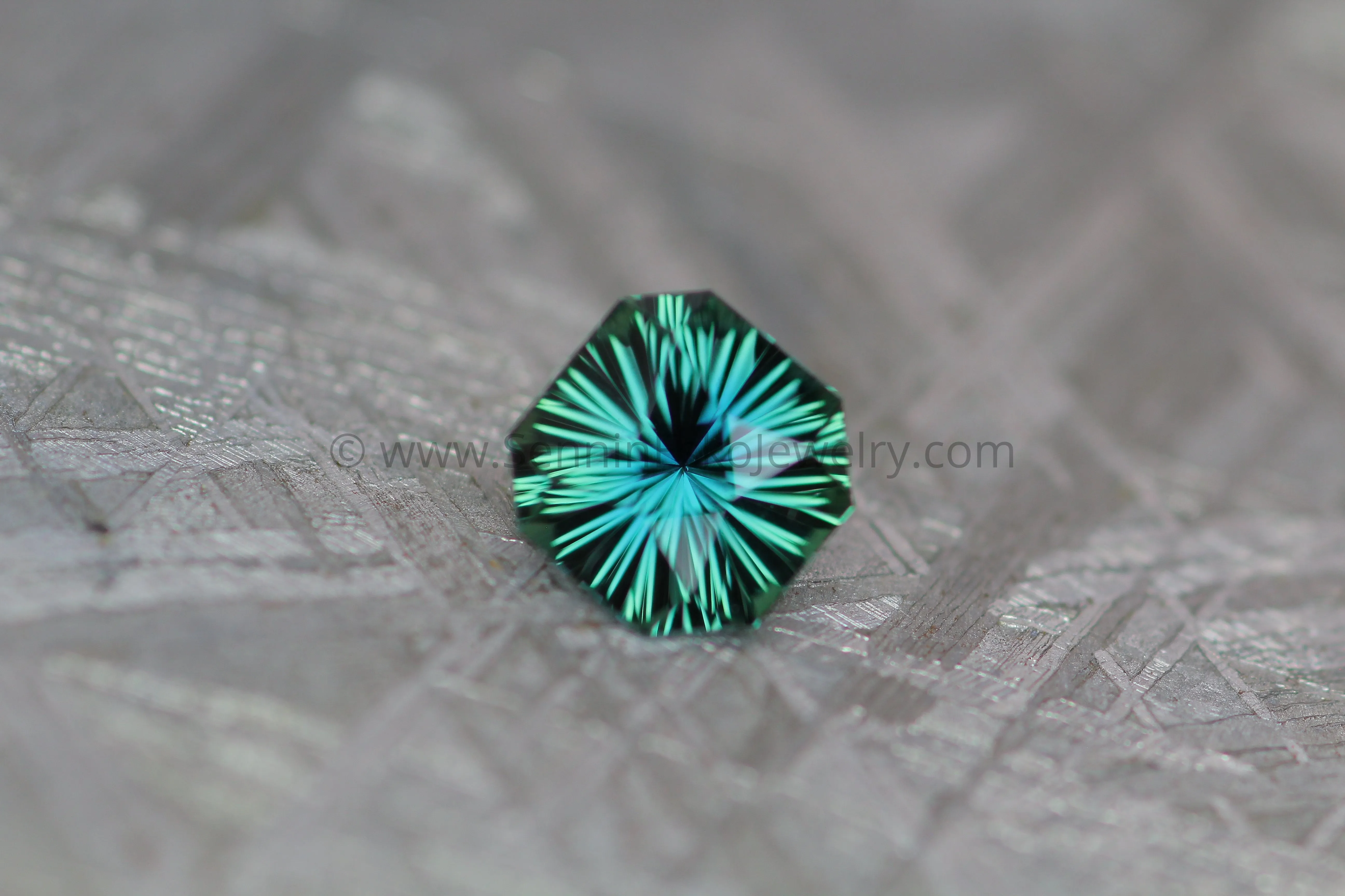 0.64 carat Teal Sapphire Octagon - Fantasy Cut, 5.3x5.7mm