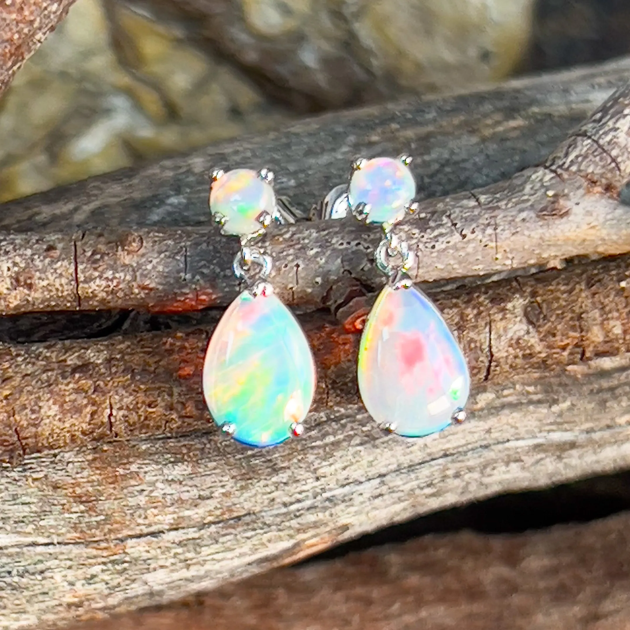 14kt White Gold pair of dangling Opal round and pearshape earrings
