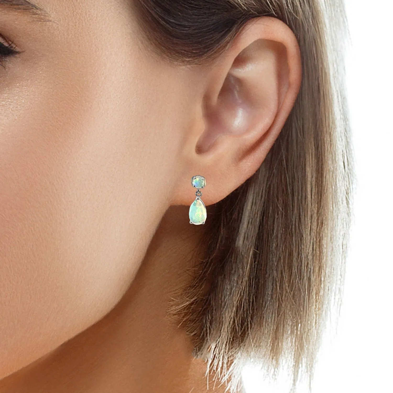 14kt White Gold pair of dangling Opal round and pearshape earrings