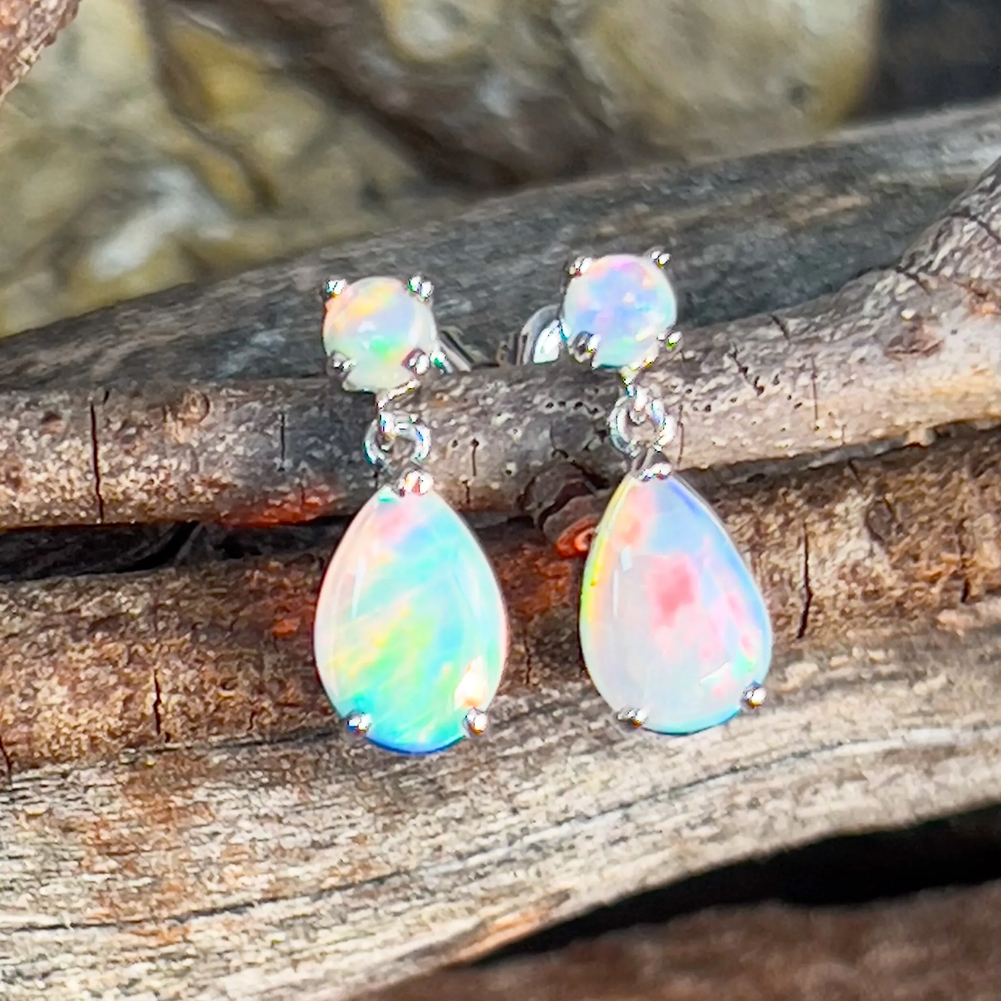 14kt White Gold pair of dangling Opal round and pearshape earrings