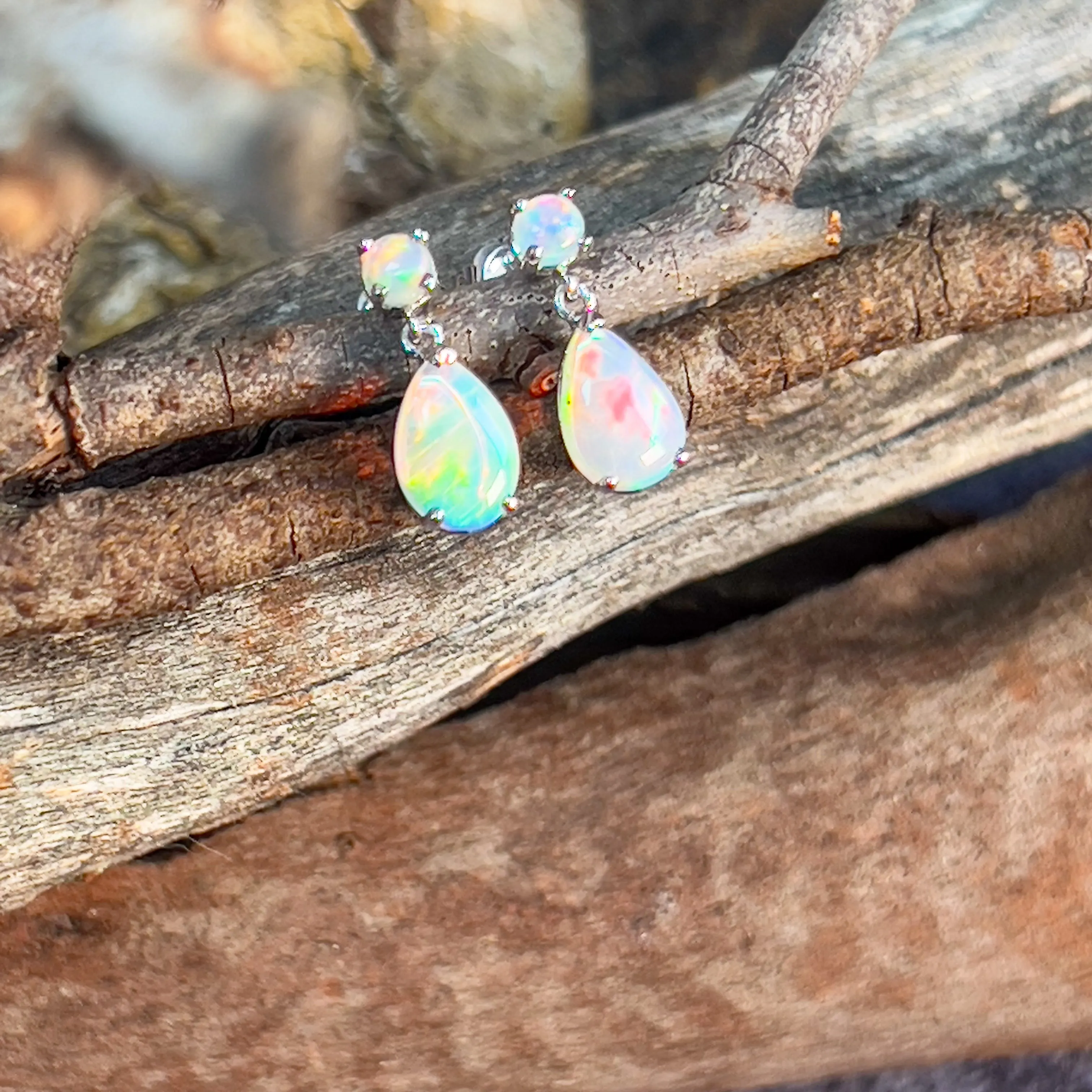 14kt White Gold pair of dangling Opal round and pearshape earrings