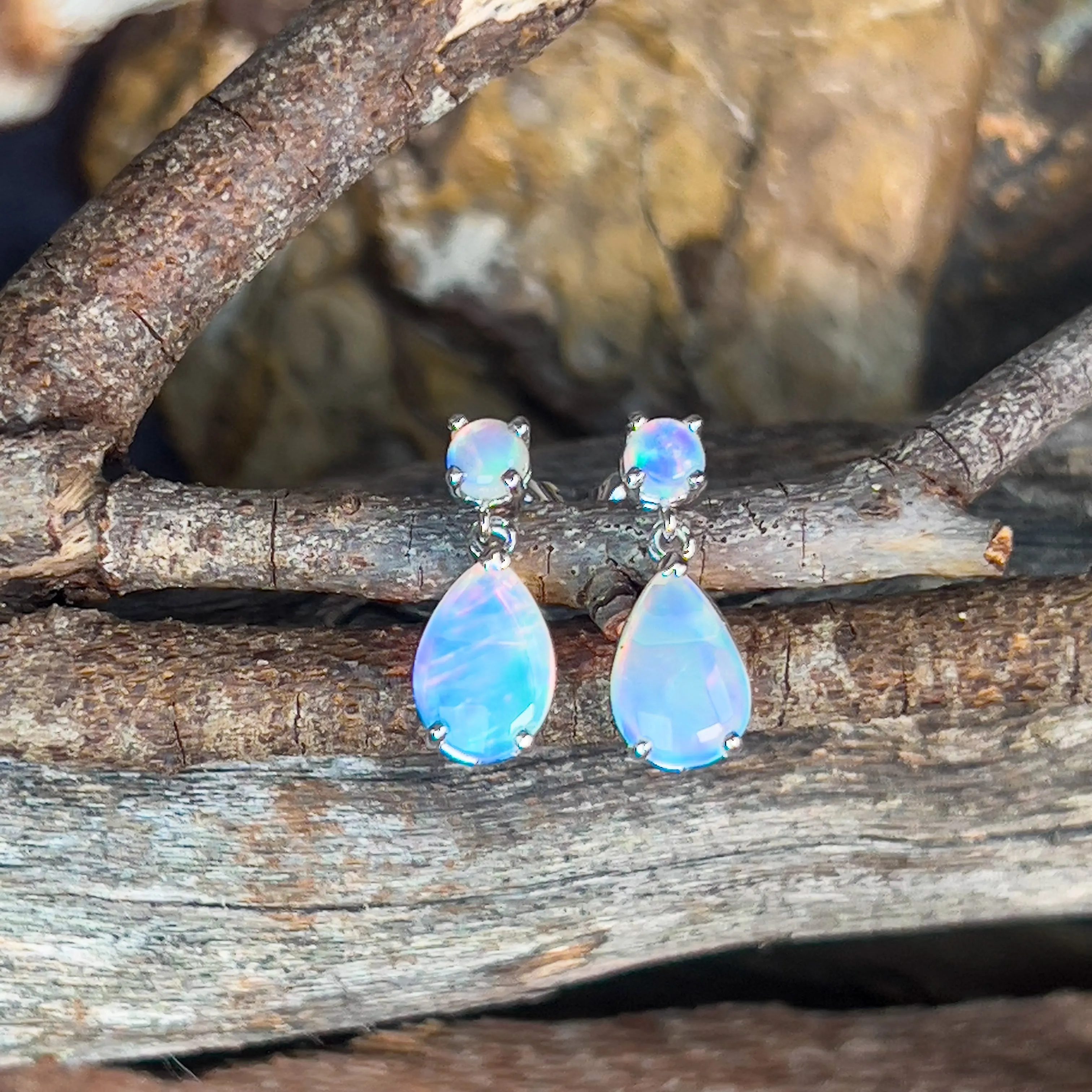 14kt White Gold pair of dangling Opal round and pearshape earrings