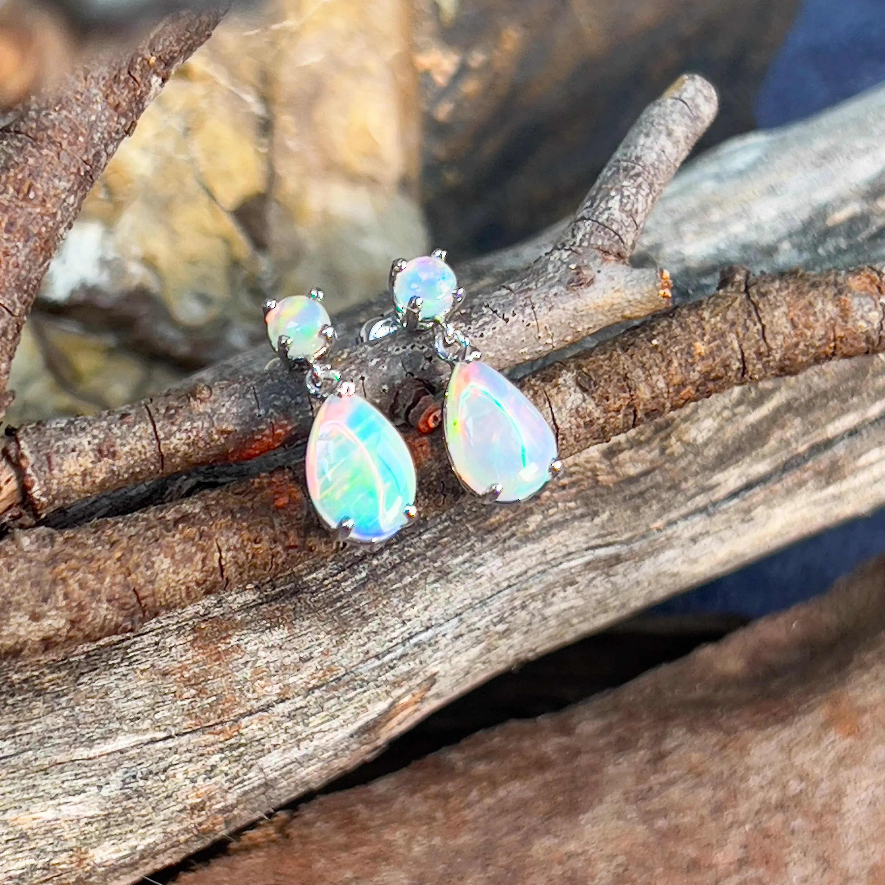 14kt White Gold pair of dangling Opal round and pearshape earrings