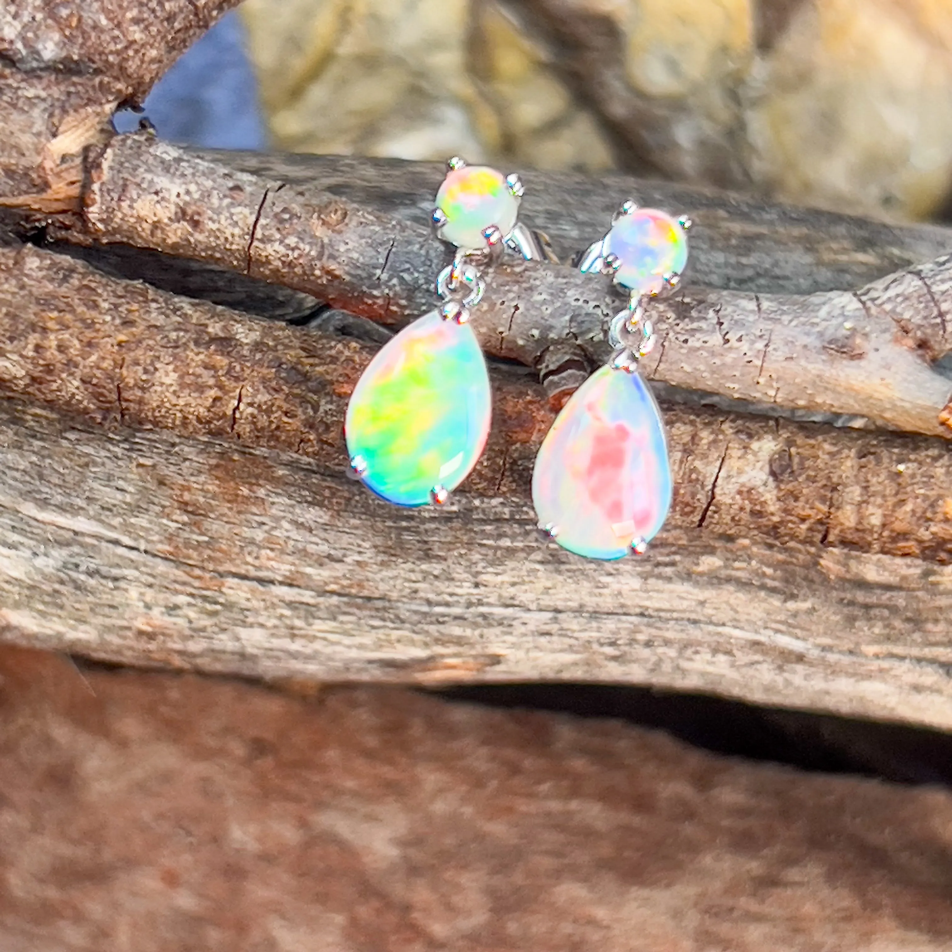 14kt White Gold pair of dangling Opal round and pearshape earrings