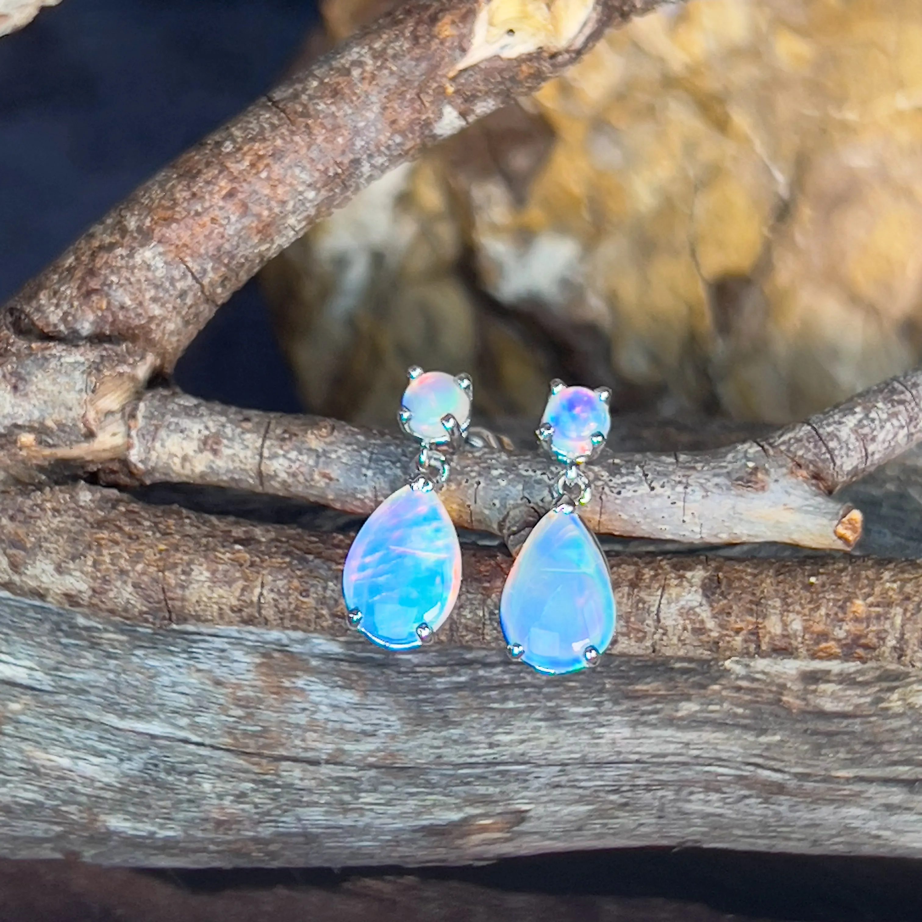 14kt White Gold pair of dangling Opal round and pearshape earrings