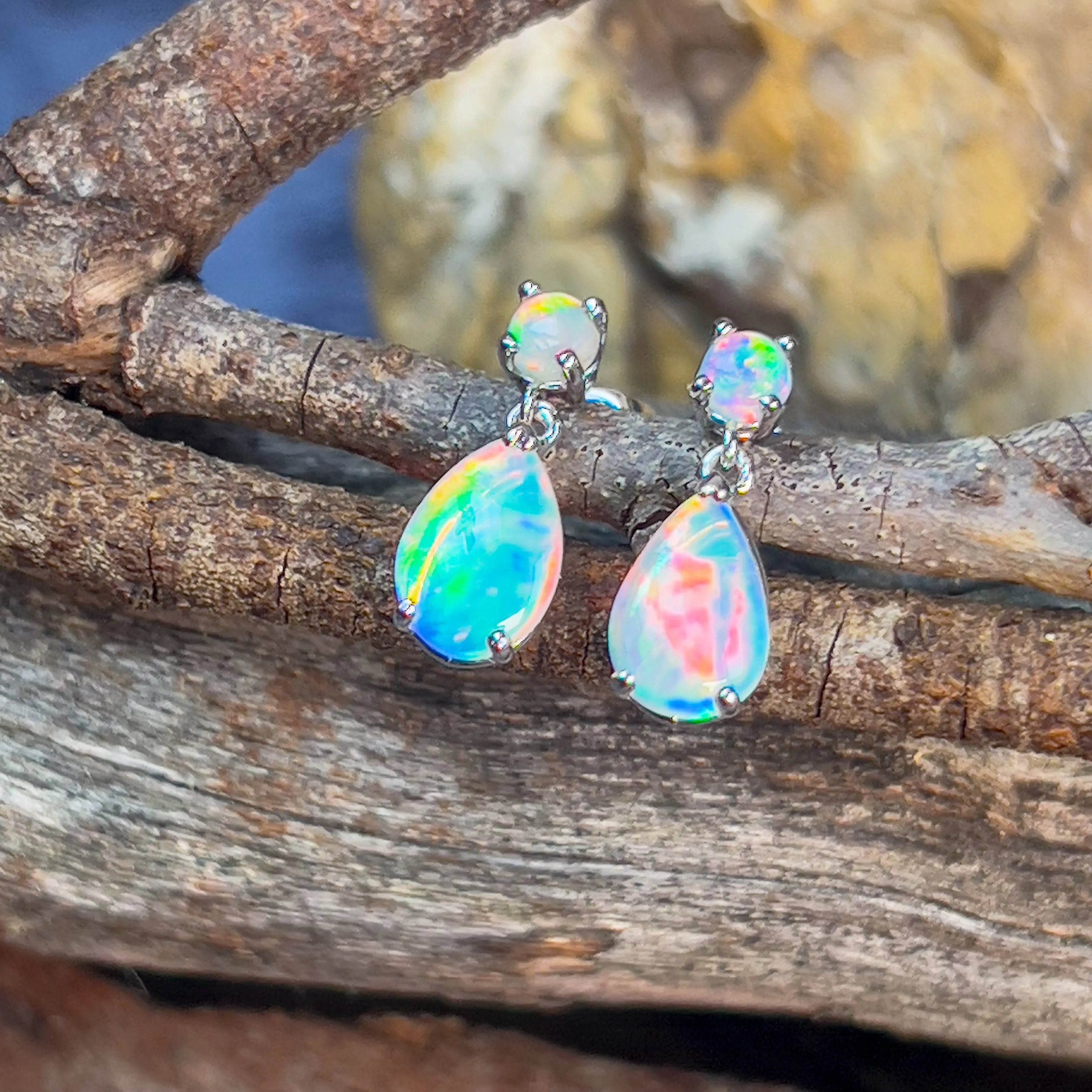 14kt White Gold pair of dangling Opal round and pearshape earrings