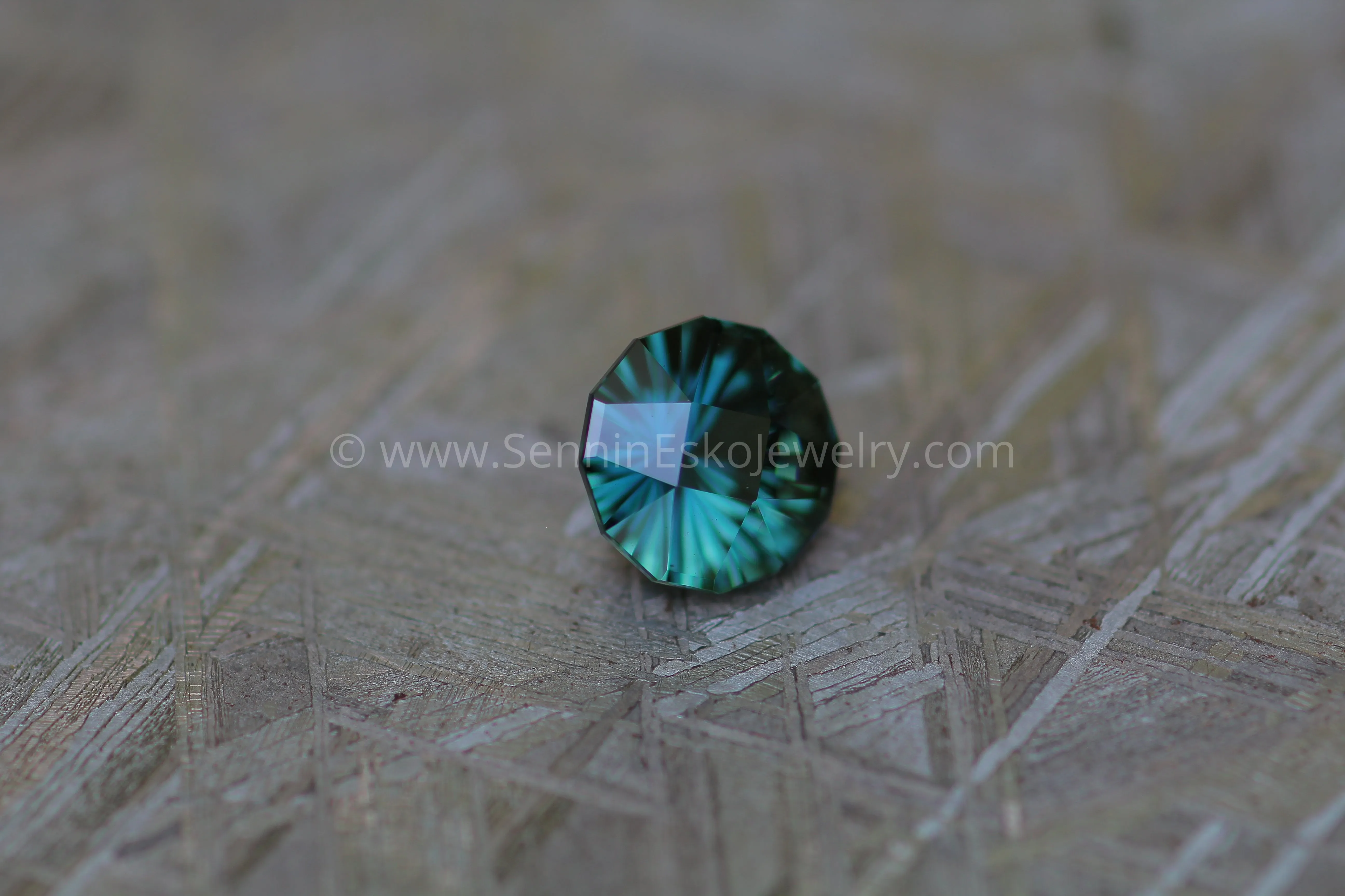 1.68 carat Blue/Green Sapphire Round - Fantasy Cut, 7mm in diameter