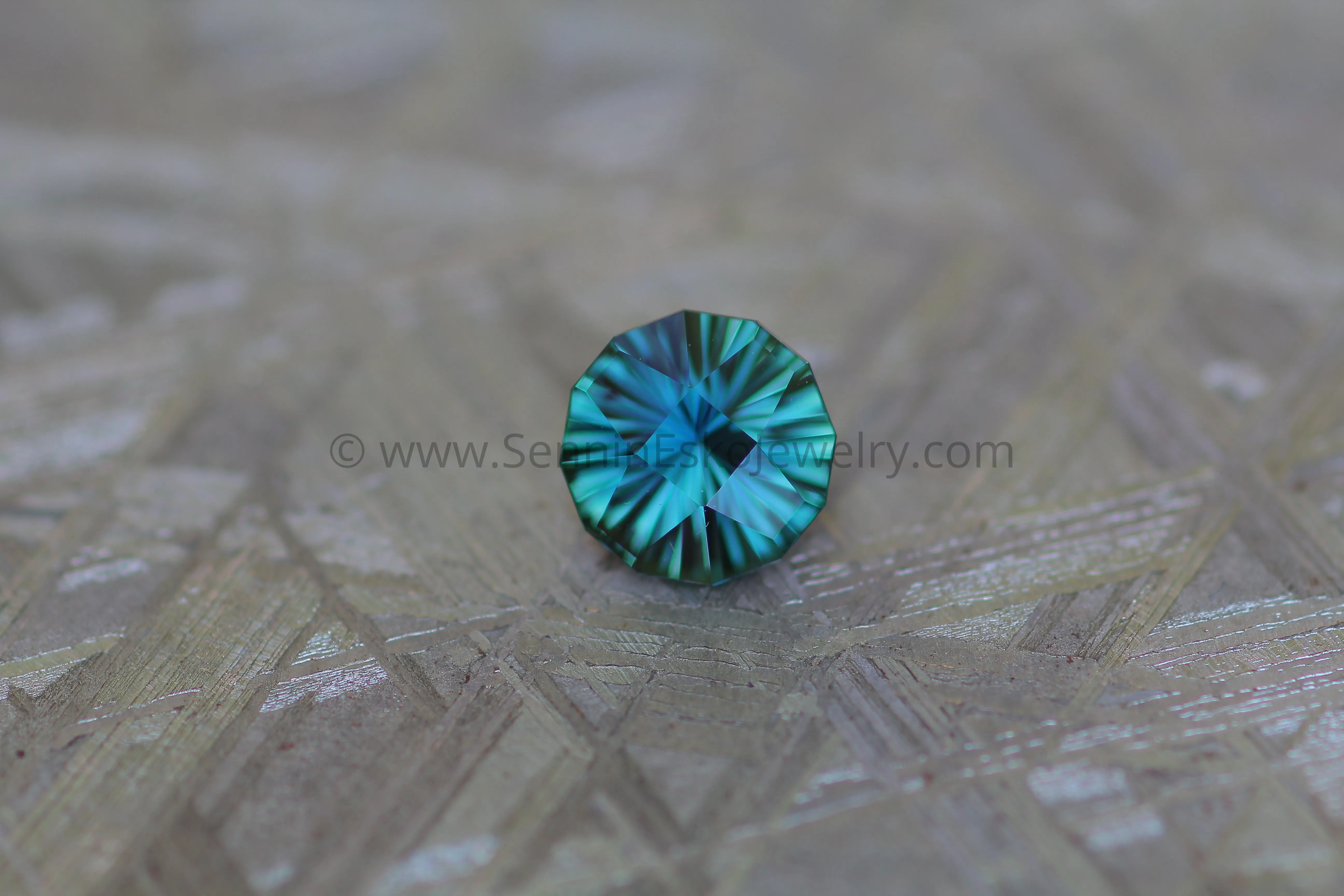 1.68 carat Blue/Green Sapphire Round - Fantasy Cut, 7mm in diameter