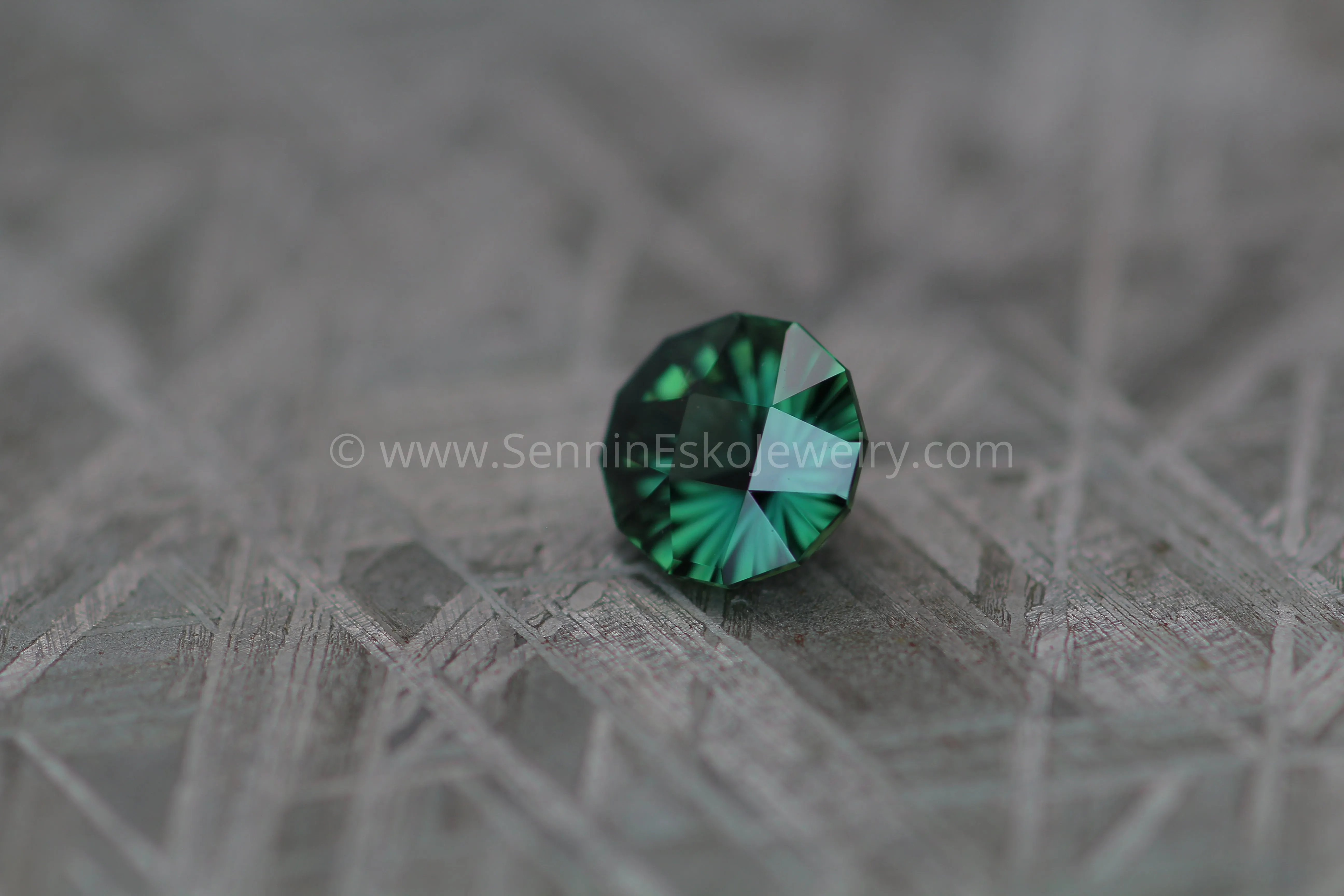 1.68 carat Blue/Green Sapphire Round - Fantasy Cut, 7mm in diameter