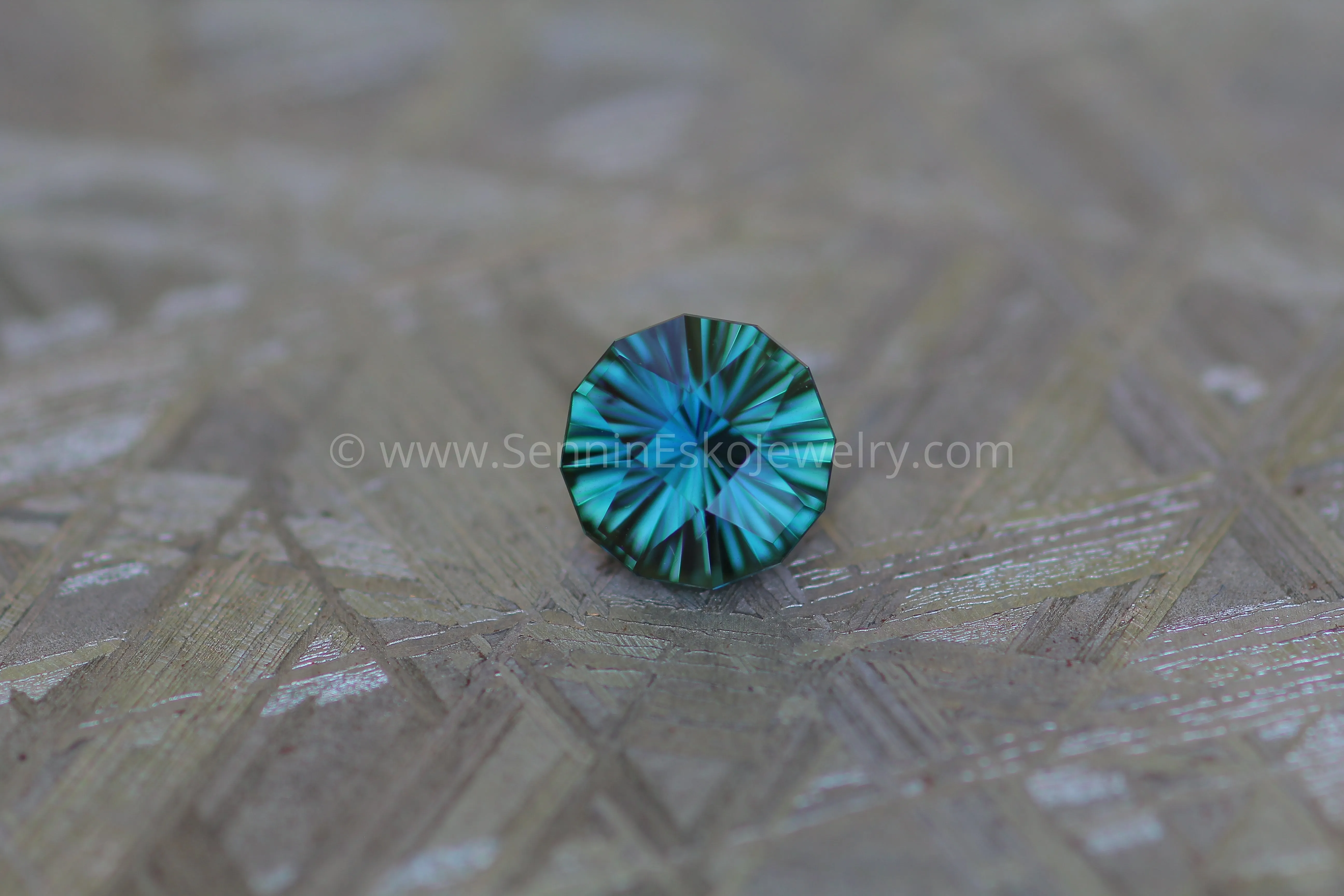 1.68 carat Blue/Green Sapphire Round - Fantasy Cut, 7mm in diameter