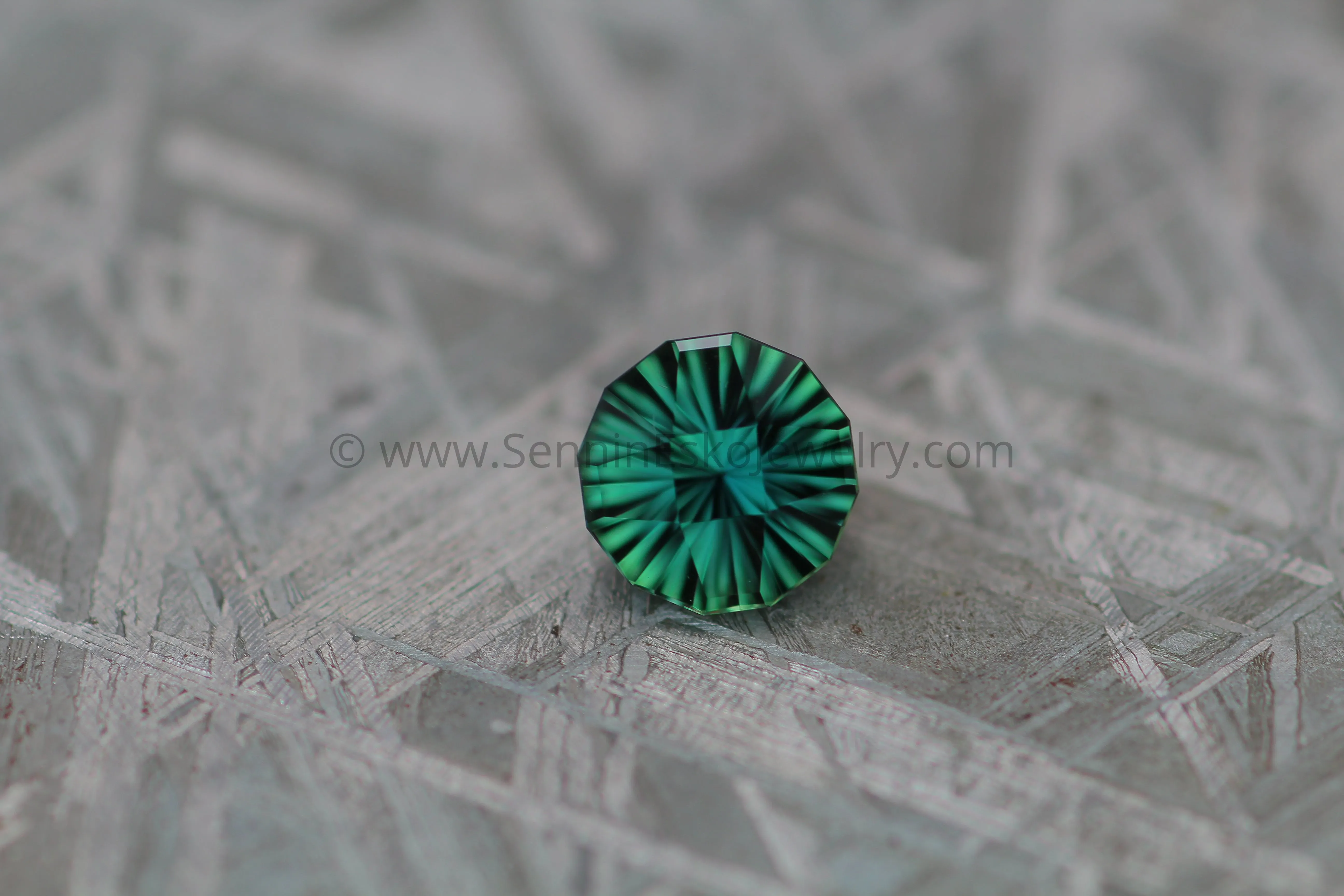 1.68 carat Blue/Green Sapphire Round - Fantasy Cut, 7mm in diameter